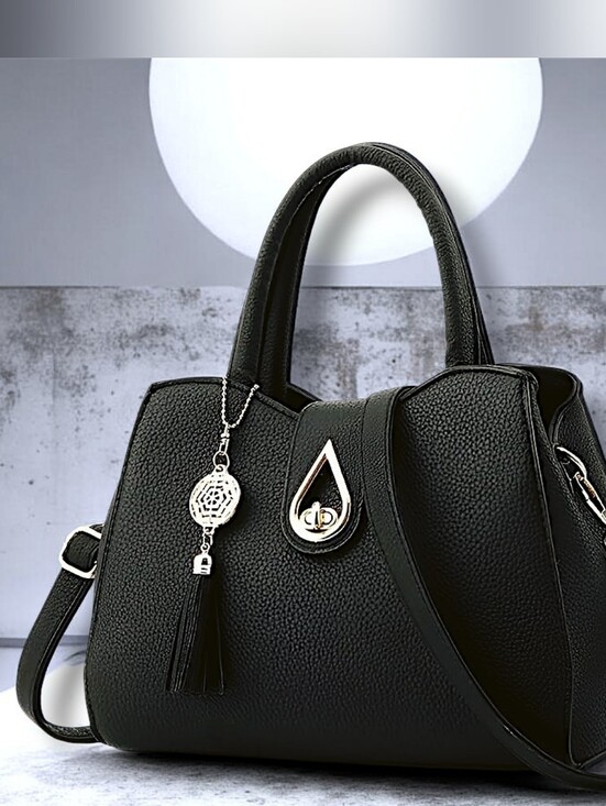 SYGA Handbags - NWOT SYGA Women's Handbag Stylish Shoulder Bag in Black w/ Tassel Charm